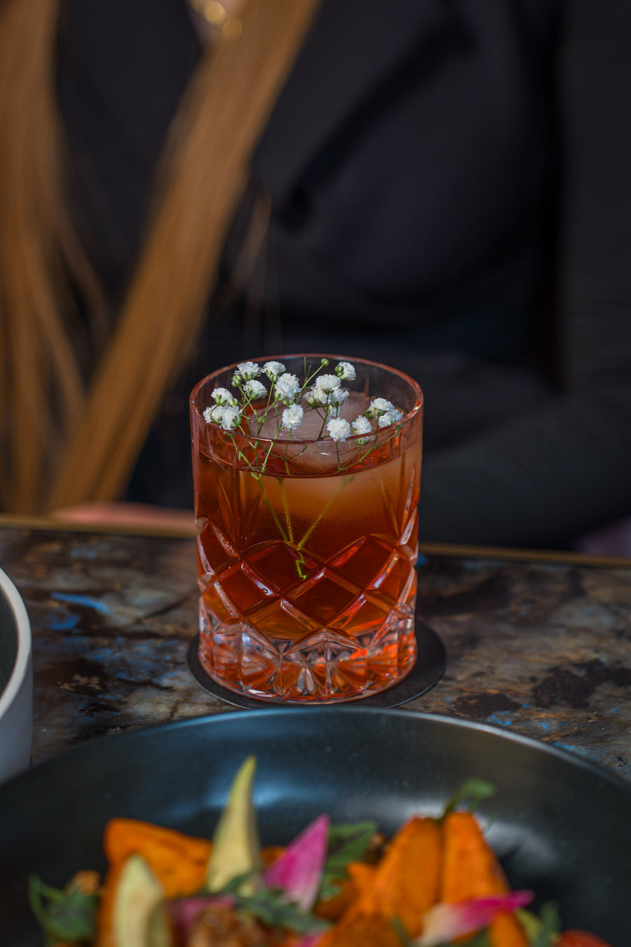 Signature cocktail served at Desi Lounge